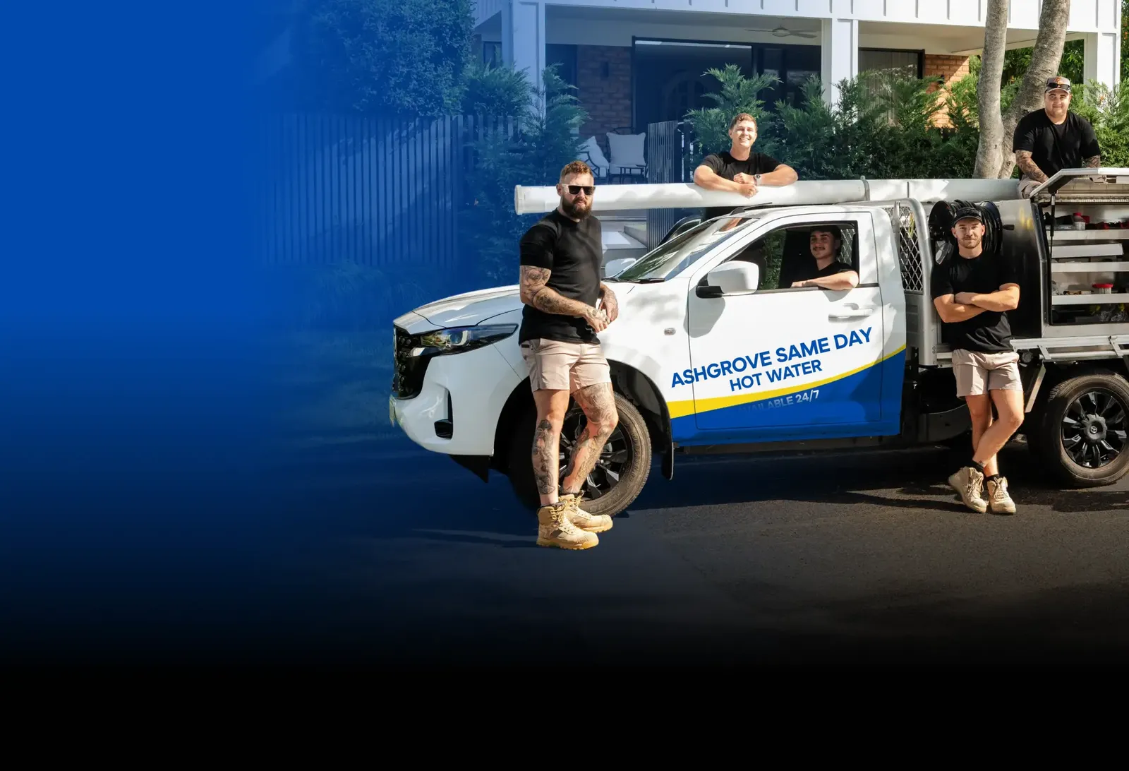 Ashgrove Same Day Hot Water team with the ute